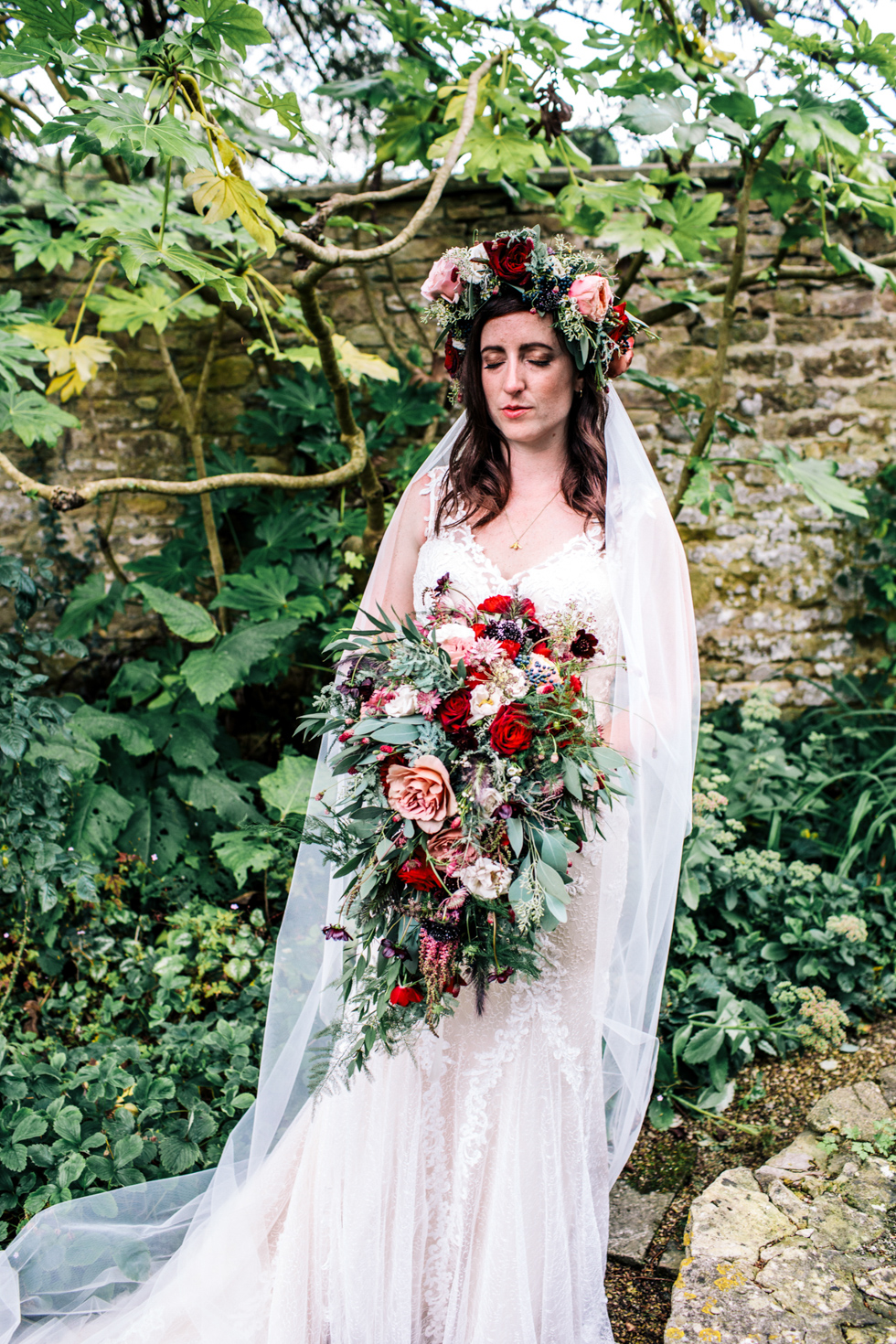 Bride looking stunning dressed like Midsomer Nights Dream at actor and literature themed wedding at Owlpen Manor