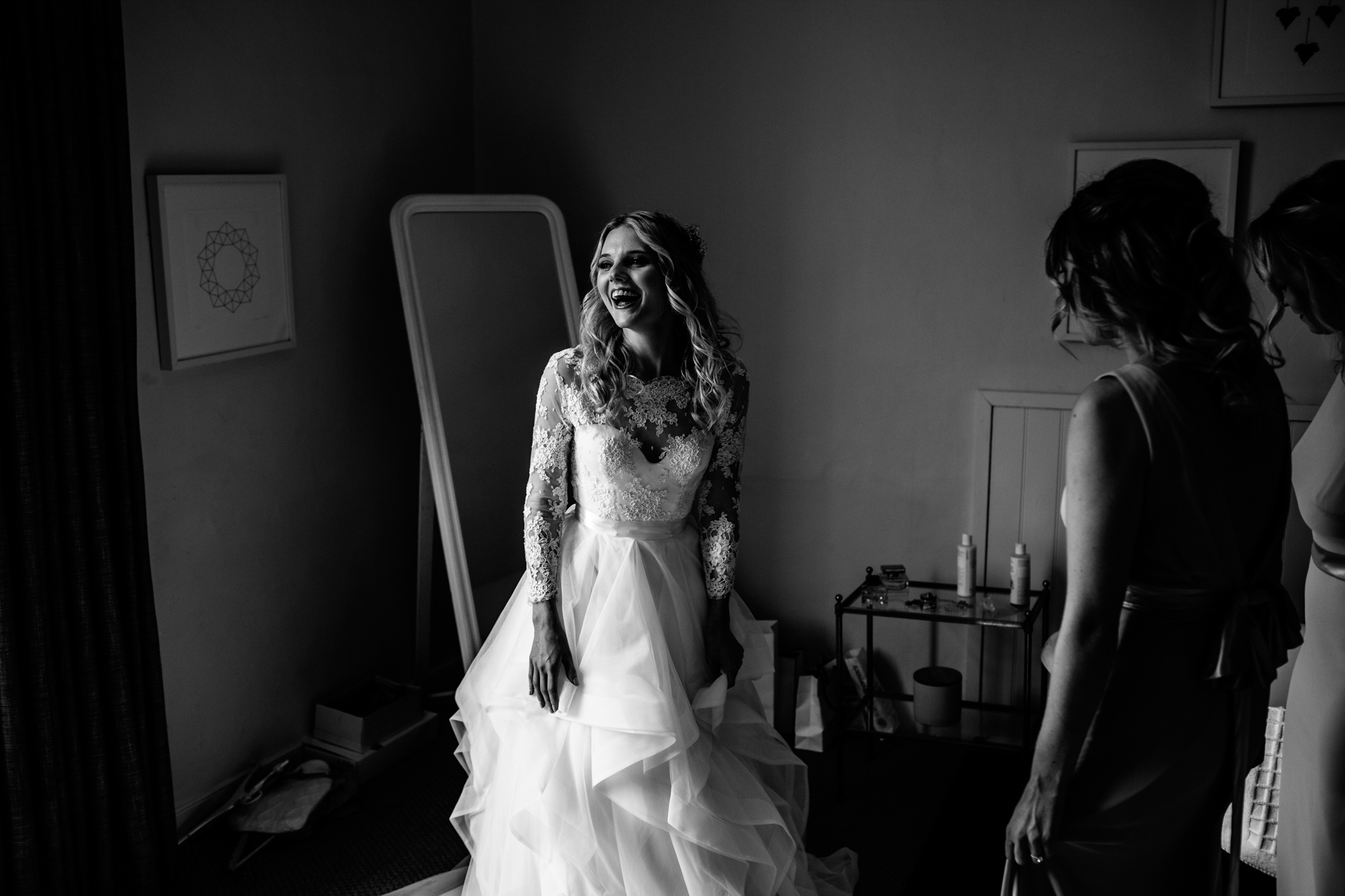 Bride wearing Emma Tindley separates of a lace top and layered skirt