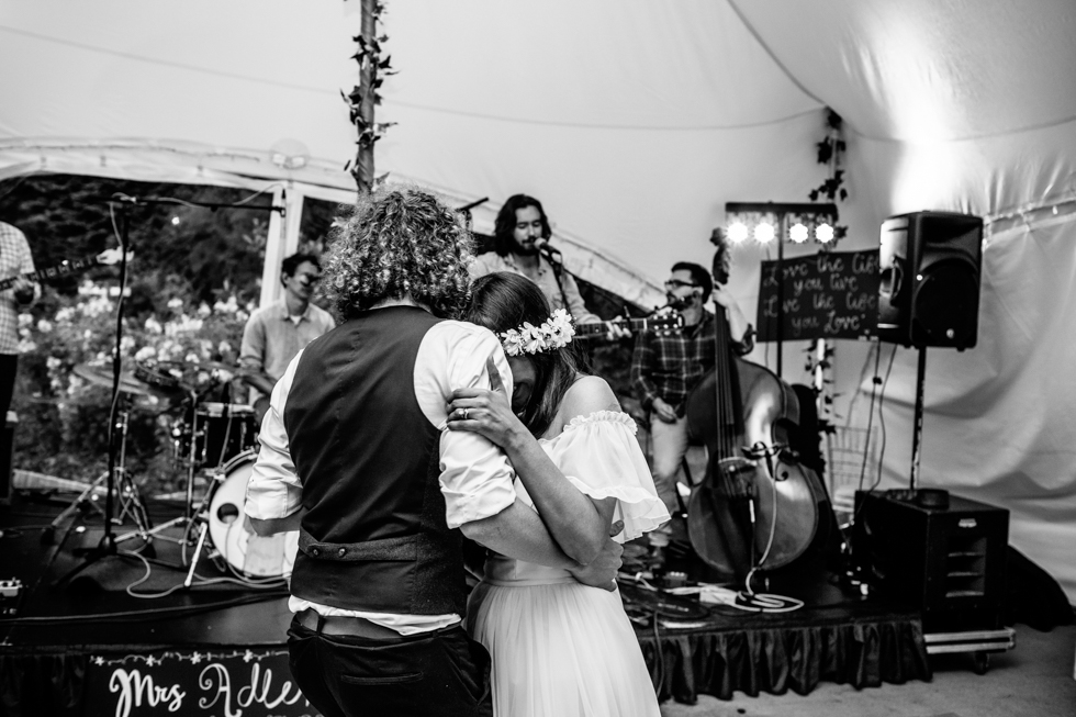 bohemian bride and groom first dance at the main stage Glastonbury style wedding
