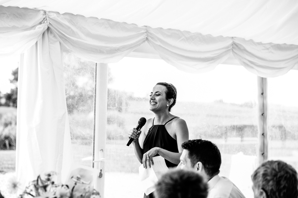 funny speeches with everyone laughing in the marquee at a seaside themed wedding at Quantock Lakes