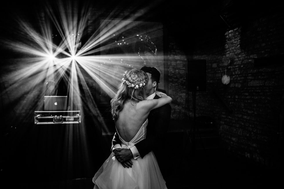 bride and groom first dance in the tythe barn Mells